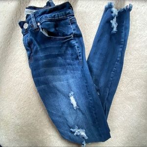 Distressed skinny jeans